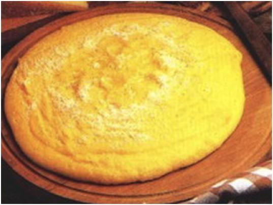 Polenta 4 cups water 1 1/2 teaspoons salt 1 cup yellow cornmeal 1/4 cup (1/2 stick) butter or margarine 1/4 cup finely crumbled feta cheese 1/4 cup (1/2 stick) butter or margarine, melted 1 1/2