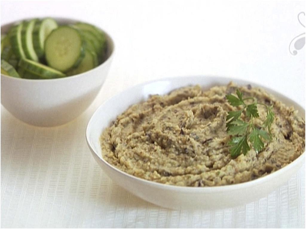 Eggplant Hummus 1 large eggplant (about 1 1/4 pounds) 3 tablespoons olive oil, divided 1/2 cup drained canned garbanzo beans (chickpeas) 1 1/2 tablespoons fresh lemon juice 2 teaspoons (generous)