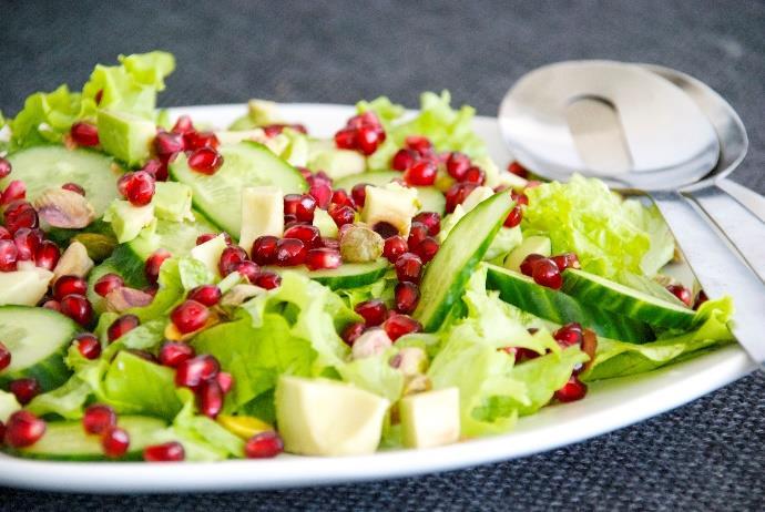 Sweet and Savory Salad [Serves 4]* 1 large head of butter lettuce ½ cucumber, sliced 1 pomegranate, seeded or 1/3 cup seeds 1 avocado, cubed ¼ cup shelled pistachios, chopped Dressing ¼ cup apple