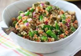 Quinoa and Pumpkin Seed Salad [Serves 4]** 1 ½ cups quinoa 2 cups filtered water ½ lb. sugar snap peas ½ cup pumpkin seeds ½ cup chives, minced ¼ cup coconut oil 2 tbsp.