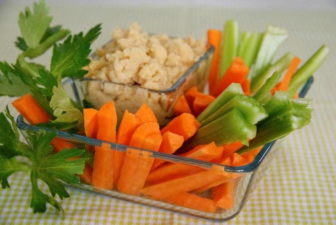 Carrot and Celery Sticks with Flavored Hummus [Serves 1]* 2 carrots, cut into sticks 2 celery stalks, cut into sticks 2 tbsp.
