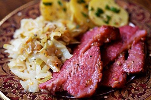 CORNED BEEF AND CABBAGE Ingredients: 4 lb corned brisket of beef 3 large carrots, cut into large chunks 6 to 8 small onions 1