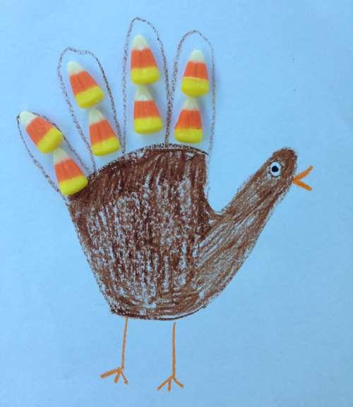 Idea #14: Handprint Candy Corn Turkey Art Need to distract the kids while you prepare Thanksgiving dinner? Here s a fun craft.