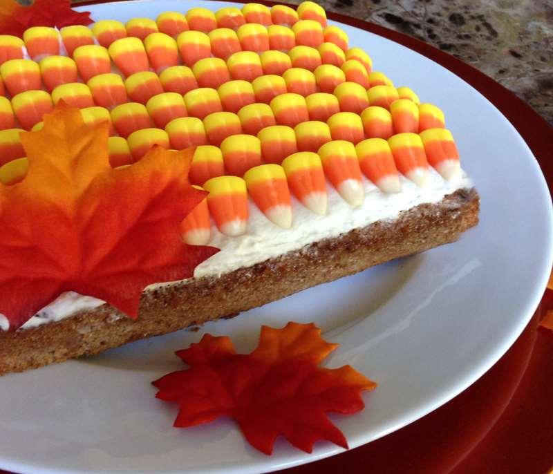 Idea #6: Candy Corn Cake Decorating Candy corns can be used in a variety of ways to decorate a cake.