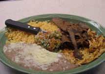 25 *Carnitas - Pork chunks cooked golden brown delicately seasoned with our secret spices served with rice, beans and 3 tortillas... $11.
