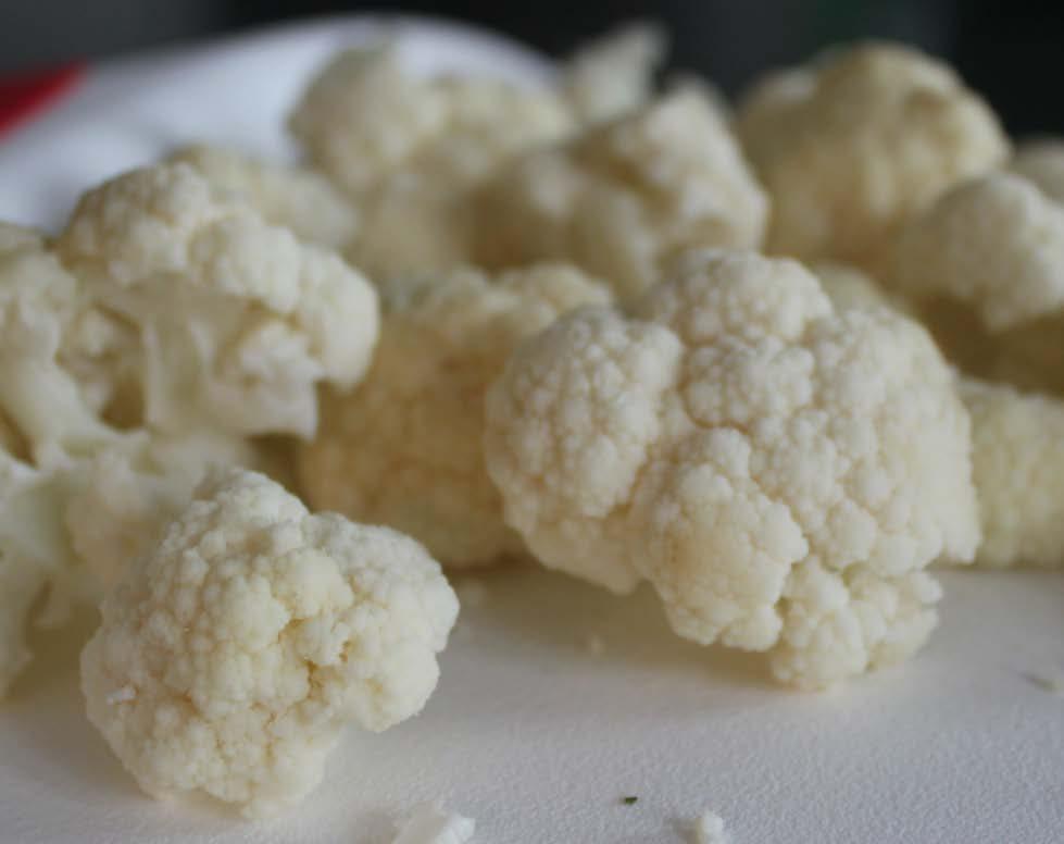 Roasted Cauli-florets 1 head of cauliflower 2-3 tbsp grapeseed or coconut oil 2 tsp coriander seed, freshly ground 1. Preheat oven to 425F convection or 450F regular. Line a bake sheet with foil. 2. Remove core from cauliflower and cut into very small florets (about size of loonies, quarters and nickels).