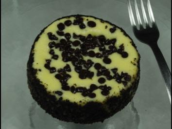 Chocolate Chip Bash Cheesecake Traditional New York style cheesecake bursting with mini chocolate