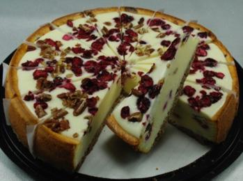 Cranberry Nut Cheesecake Plain cheesecake exploding with cranberries and pecans, finished with