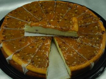 Pecan Royale Cheesecake Plain cheesecake blended with pecans and caramel in a graham cracker crust