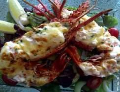 SEAFOOD WHOLE LOBSTER.. Market Price Australian crayfish 450gm baked with butter served with chips & salad. MARRON..... $ 48.