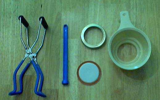 From le to right: Other Equipment: 1. Jar liing tongs helpful to pick up hot jars 2. Lid lier - to remove lids from the pot of hot water 3. Lid - disposable - you may only use them once 4.