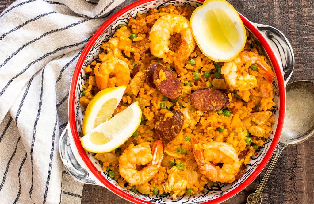 FISH AND MEAT DISHES Paela 1 medium onion, diced 1 medium carrot, diced 2 garlic cloves, minced 1 cup arborio rice 2 cups chicken stock 1 tablespoon tomato paste 1 teaspoon sweet smoked paprika 1