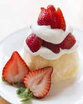 Dessert Low-Fat Strawberry Shortcake Makes 4 servings 4 slices angel food cake Sliced strawberries tablespoon sugar Low-fat whipped topping Wash and slice strawberries.