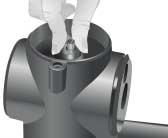 With the corkscrew-shaped auger shaft facing into the motor housing, insert the