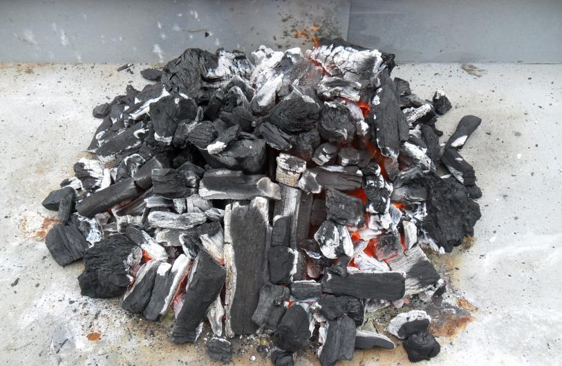Pictured Above: Once the charcoal has changed colour, it is ready to spread out