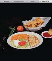 50 A large flour tortilla stuffed with beef, rice and beans covered with red sauce and cheese dip Burrito Fajita 9.
