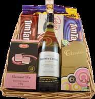 Éclairs Presented in a colourful box, enclosed or cellophane wrapped with a handmade bow Basket of Bliss - $75 1 Bottle Jacobs Creek Chardonnay, 750ml 1 Box Cadbury Roses, 150g 1 Box Gran s Coconut