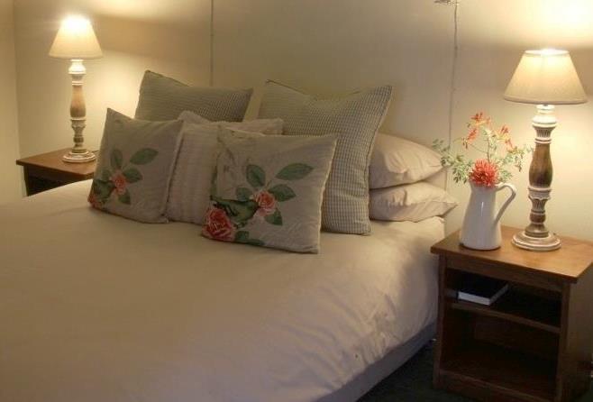 CHALETS 10 X Self-catering thatch cottages provide comfortable and cosy accommodation. Chalets are 1 or 2 bedroomed. All chalets have a kitchen, bathroom and lounge/dining room with a fire place.