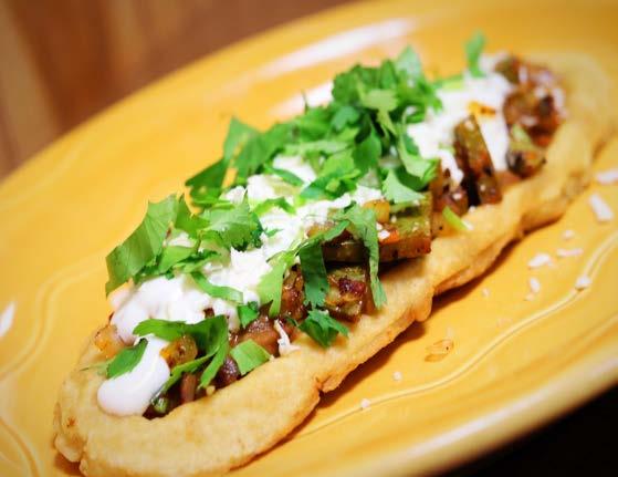 Sopes A handmade thick tortilla topped with beans, lettuce, cheese, and sour cream 3 plain 7.99 3 carnitas 8.99 3 chicken 8.99 3 al pastor 8.99 3 chorizo 8.99 3 steak 8.99 1 plain 2.59 1 any meat 2.