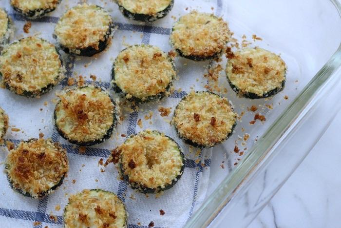 In a flat bowl, mix Panko break crumbs and Parmesan cheese together Place in each Zucchini chip and cover both sides with the mixture Place in the greased baking pan Step 4: Bake for 45 minutes or
