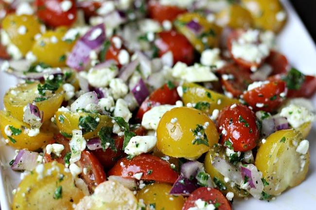 SALADS SALADS TOMATO FETA SALAD INGREDIENTS: 1 cup Sunburst Tomatoes, cut in half 1 cup Cherub Tomatoes, cut in half 1 cup Red Onion, chopped 2