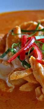 1 cup chicken, cut into bite sized pieces 1/2 cup coconut milk 1 tablespoon chopped garlic 2 to 3 tablespoons Penang curry paste 2 tablespoons fish sauce sugar to taste 3 kaffir lime leaves, shredded