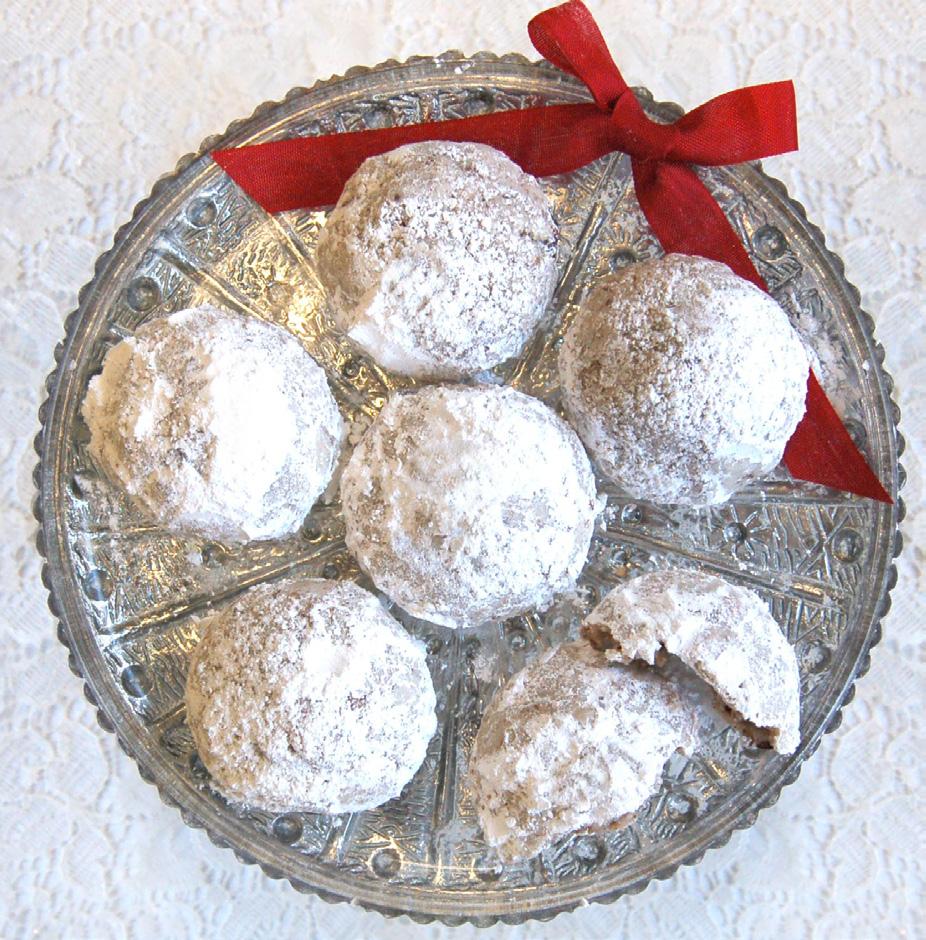 of our pecan thumbprint cookies finished with white chocolate and