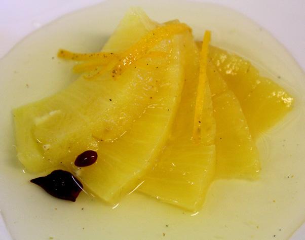 POACHED PINEAPPLE 1 Pineapple ½ Vanilla pod 1 Star anise 1 Orange zest 200 ml water 200 gr sugar Peel the pineapple removing any eyes. Cut it into quarters the cut each in half to create chunks.