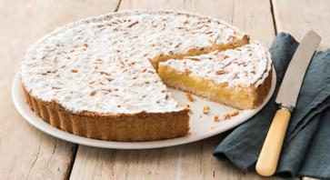 TORTA DELLA NONNA (GRANDMOTHER CAKE) Pastry cream with a hint of lemon on a base of shortcrust pastry, covered with pine nuts, almonds and powdered