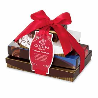 WIN OVER Your Clients, All Over Again A a. Chocolate Lovers Gift Basket Filled with love and chocolate. Tied with festive red ribbon.