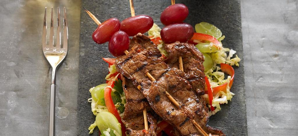 Korean Barbeque-Spiced Flank Steak and Grape Skewers Makes 8 skewers Sweet and spicy beef strips are pleasingly cooled by the addition of fresh, juicy California grapes on each skewer, a delightful