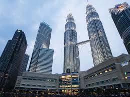 The buildings are a landmark of Kuala Lumpur, along with nearby Kuala Lumpur Tower.