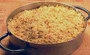 RICE, PILAF (STEAMER METHOD) - 83000 1 day - cooked, held under refrigeration 1 day - carried over 2 hours 2 Quarts Water Hot, (195º - 205ºF) Full Size Pan 1 Package Rice Pilaf W/ Seasoning Packet