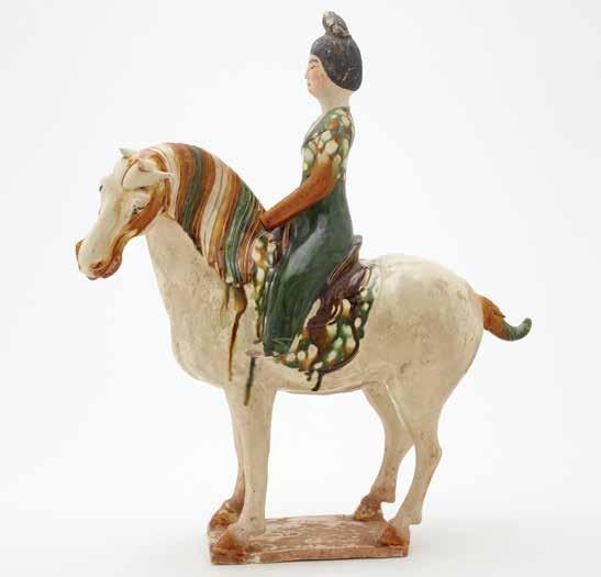Tang China s artistic achievements include ceramic figurines such as this one. These figurines were usually decorated with brightly colored glazes.