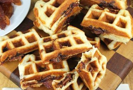 Apple Butter and Bacon Stuffed Waffles Makes 4 servings Prep Time: 25 minutes Cook Time: 0 minutes 2 8-ounce cans refrigerated crescent dough ½ cup MUSSELMAN S Apple Butter 8 slices bacon, cooked and
