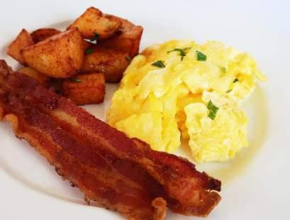 29 per guest Fluffy Scrambled Farm Fresh Eggs G V Applewood Smoked Bacon G Sausage Patties G Red Pepper-Onion Roasted O Brien Potatoes G Tropical Fresh Fruit Display G Vg BREAKFAST FAVORITES QUICHE