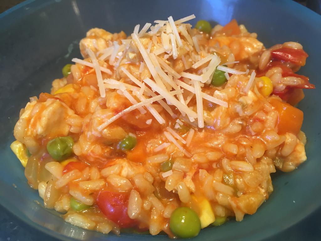 Ingredients: 1 1 1 4 1 tablespoon rice bran oil small onion, finely diced celery stalk, finely diced cloves garlic, finely diced cup arborio rice 1 x 400g whole peeled cherry tomatoes 1 cup mixed
