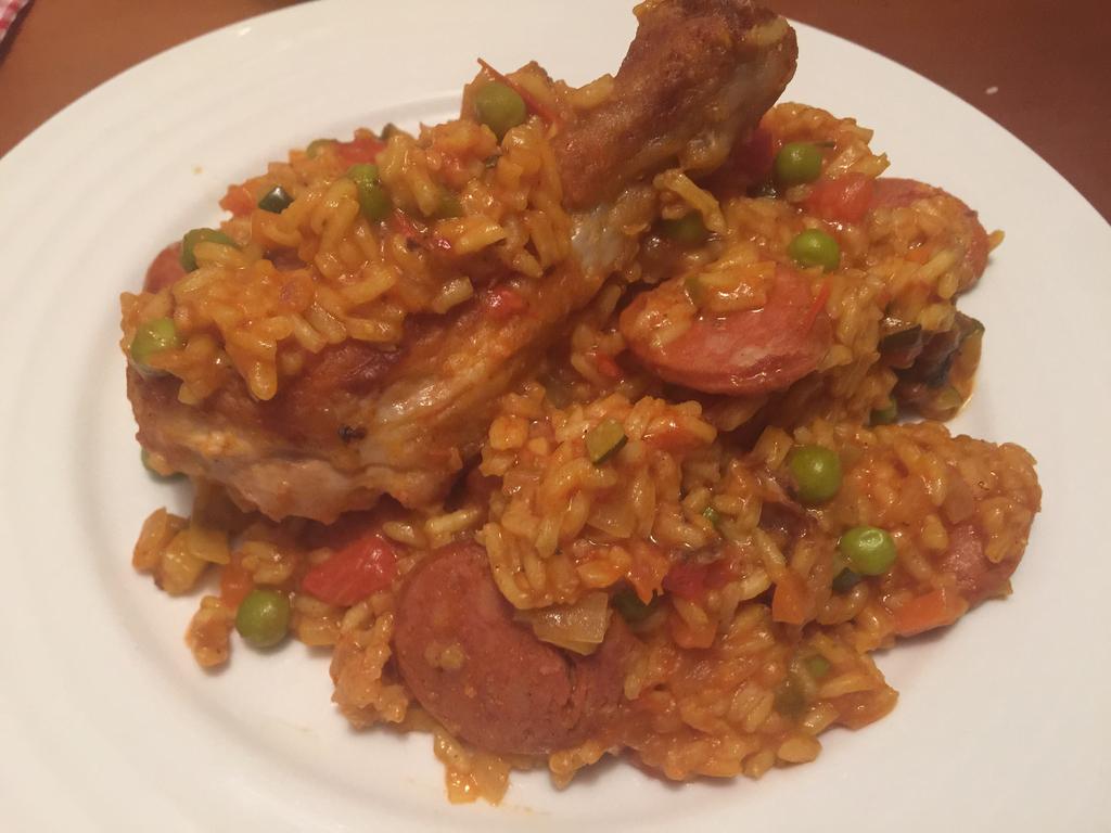 Ingredients: 10-12 chicken drumsticks 1/4 cup plain flour 1 tablespoon paprika 2 tablespoons rice bran oil 2 chorizos 1 large onion 3 cloves garlic 1 large carrot 1 small