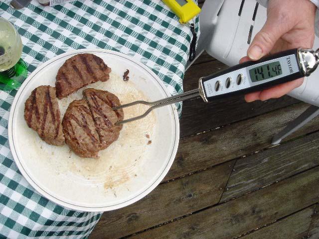 8-oz. hamburger temperature Figure 6. Fork thermistor thermometer Results Table 1 shows the cooking times and temperatures for the various hamburgers. Table 1. Hamburger Cooking On Weber Grill, June 4, 2005 All hamburgers were 4 inches in diameter; 4 oz.