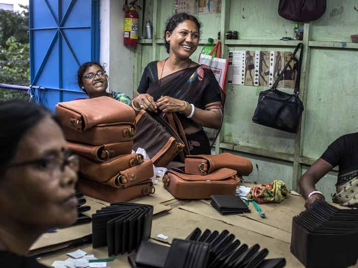The essence of fair trade Kolkata, India: Artisans at work at Oxfam producer partner Madhya Kalikata Shilpangan workshop. Photo: Atul Loke/Panos/OxfamAUS.