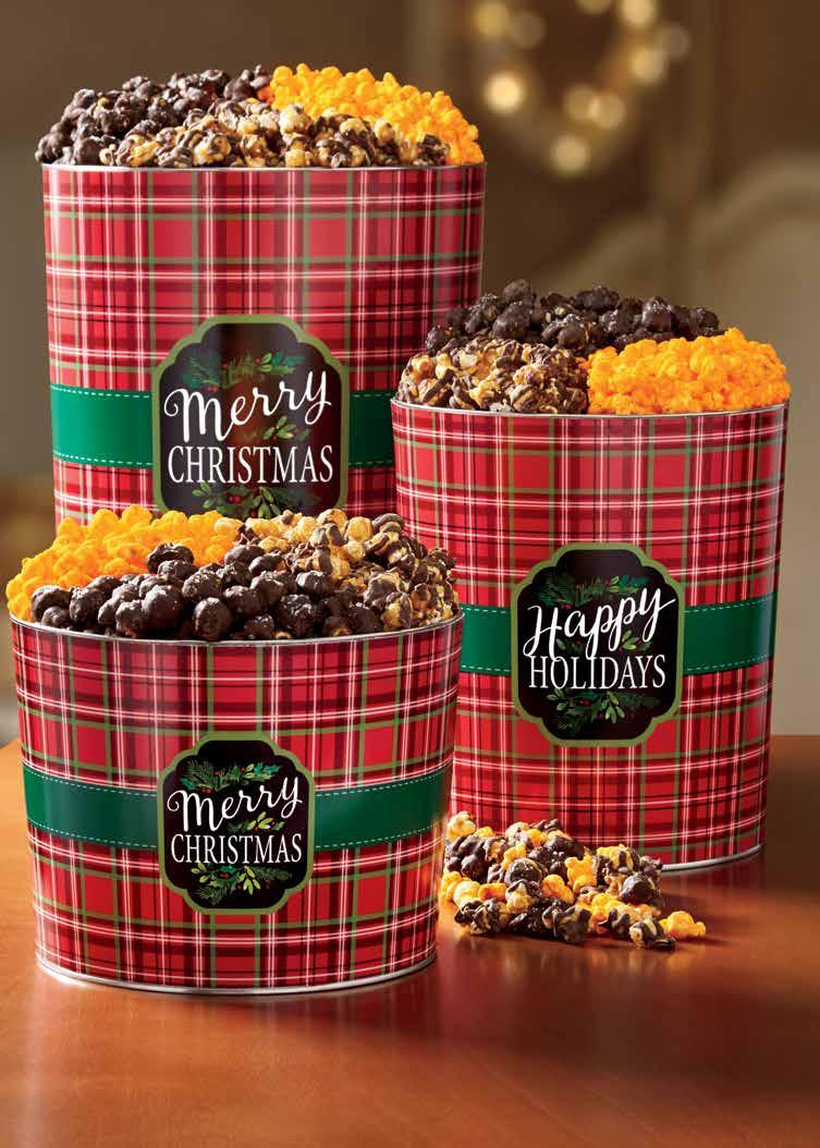 MERRY CHRISTMAS & HAPPY HOLIDAYS PLAID DELUXE POPCORN TINS new! Indulge in decadent Double Cheddar, Dark Chocolate & Sea Salt and Drizzled Caramel popcorn flavors.