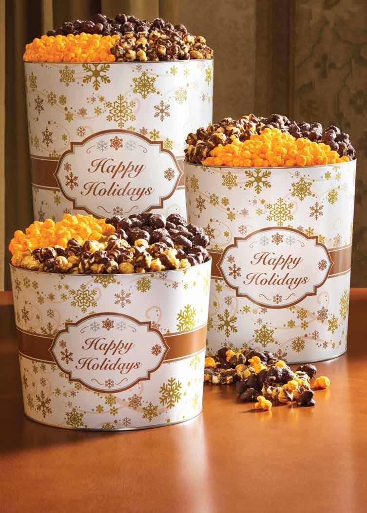 GOLD SNOWFLAKE DELUXE POPCORN TINS new! A special mix of Double Cheddar, Dark Chocolate Sea Salt and Drizzled Caramel popcorn flavors creates a gift with extra flair.
