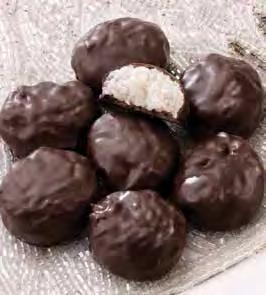 00 Chocolates con nueces French-roasted pecans, thick golden caramel, and creamy milk