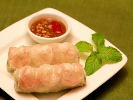 with coconut milk, filled with shrimp, sliced pork, onion and