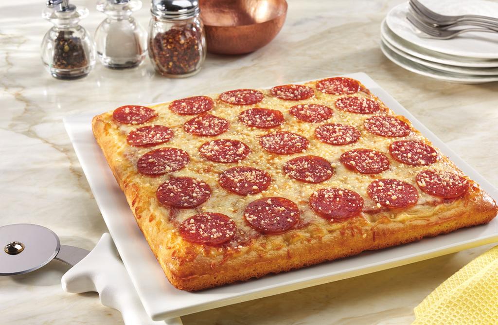 Our Detroit-style deep dish crust is layered with our signature pizza sauce, 100% Mozzarella and Muenster cheeses, premium
