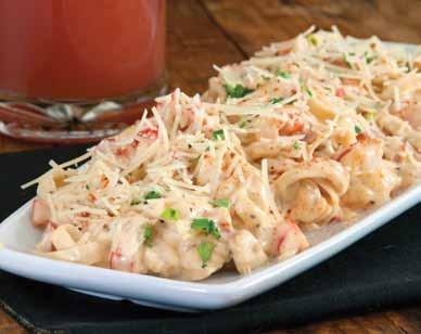 Pappardelle pasta tossed in a white wine sauce with oven roasted cherry tomato, corn, scallions, and parmesan cheese. 13.99 With Grilled Chicken 14.99 With Sautéed Shrimp 19.