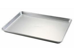 Jelly Roll Pan Similar to a baking (cookie sheet) but it has sides.