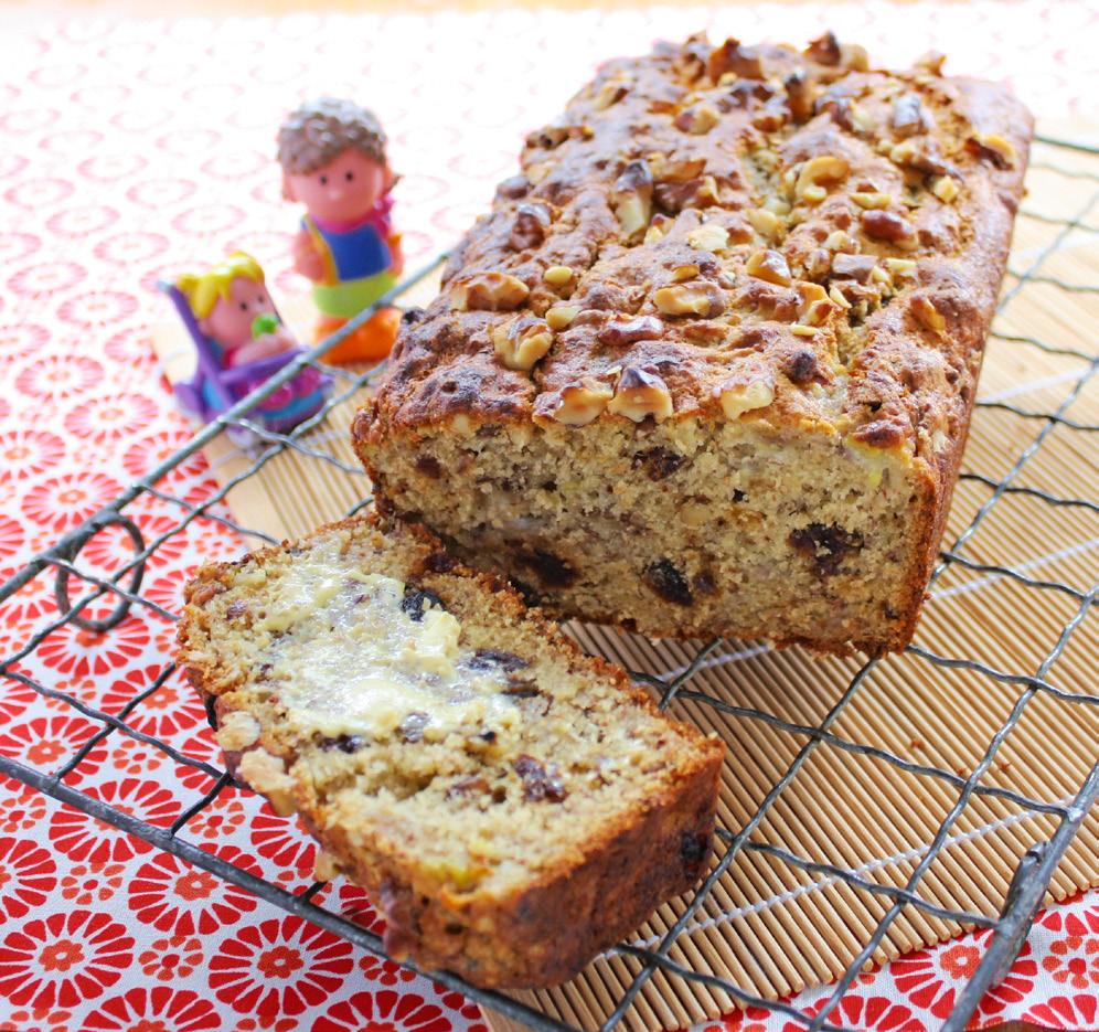 (The best) banana bread Canola oil cooking spray 45g pitted dates, chopped 55g walnuts, plus extra, for sprinkling 100g butter, melted 4 overripe bananas, mashed 2 eggs, whisked 260g self-raising