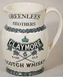 5ins tall, green print GREENLEES BROS CLAYMORE SCOTCH WHISKY with Crown & crossed swords tm to both sides, Royal Doulton pm, fine crazing, Very Good R$700 (800 1000) 184 CORBETT 8ins tall, modelled