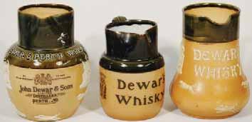 ABBOTSFORD WHISKEY 9ins tall, with handle & pouring spout, 2 tone salt glazed ABBOTSFORD WHIS- KEY with picture of Robbie Burns. Doulton Lambeth pm, Very R$600 (700 800) 67.